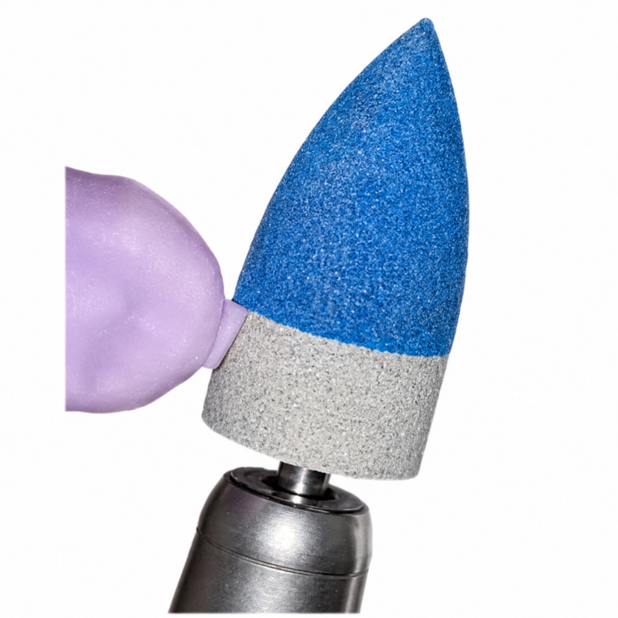 Macro close-up of the Wagner SRS™ 100 diamond-infused polishing surface showing the white textured abrasive tip used for sprue removal and interface refinement on glass-ceramic dental restorations.