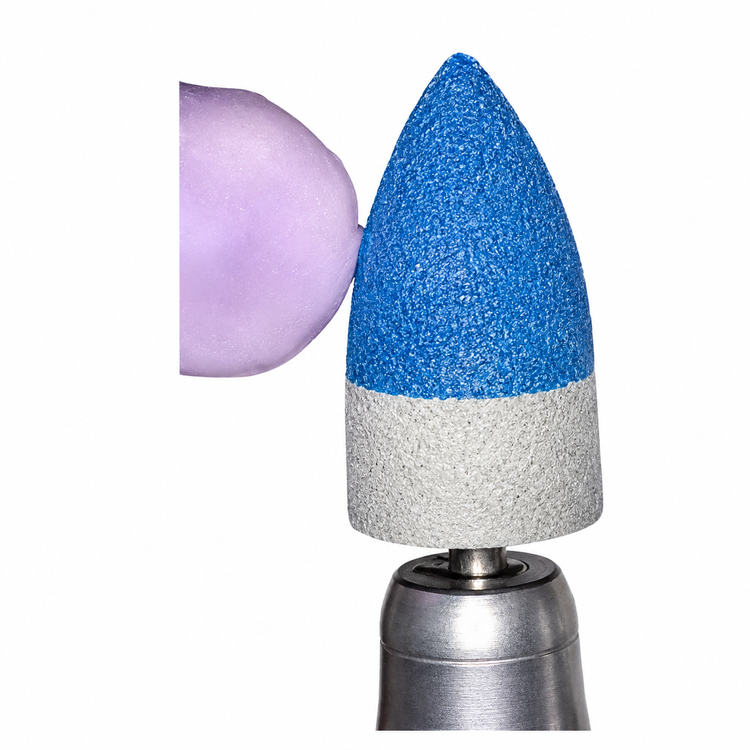 Close-up of the Wagner SRS™ 100 diamond-infused polishing tip demonstrating the blue abrasive surface used for sprue removal and interface refinement on glass-ceramic dental restorations.