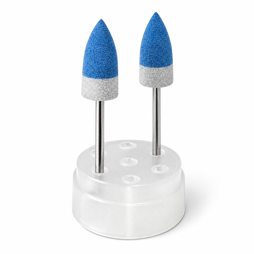 Wagner SRS™ 100 Sprue Removal System with two diamond-infused polishing instruments for removing sprue connectors and refining glass-ceramic restorations in dental laboratories.